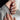 Silver chrome French tip press-on nails on medium almond shape — mirror-metallic tips over a sheer nude base, the defining chrome nail design trend for 2026, handmade by Joyee Nails.