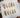 Cottagecore press-on nails featuring hand-painted daisies, wildflowers, and pastel floral designs