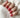 Red polka-dot artistic nail art.