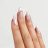 Love Letter pink and white press-on nails with 3D bow and heart accents on almond shape — romantic coquette nail design featuring the classic pink-and-white color combination, handmade by Joyee Nails.