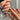 Colorful short squoval press-on nails with bright mixed summer shades — the universally flattering squoval nail shape shown on natural hands, handmade by Joyee Nails.