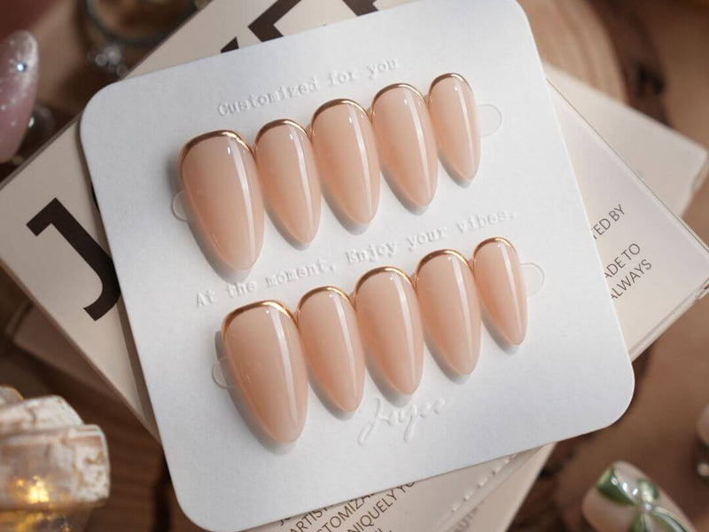 Almond shaped press-on nails from Joyee Nails showing the elegant tapered almond nail shape