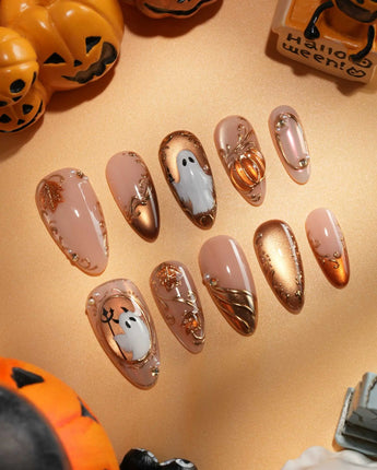 Ghost Portrait press on nails with ghosts in raised gold frames, gold filigree, pearls and a 3D copper pumpkin on copper cat eye - image 1