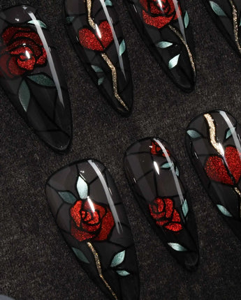 Cathedral Rose gothic press on nails with red glitter roses, hearts and mint leaves in black stained glass lines on a smoky sheer base - image 1