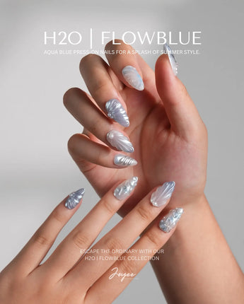 Great Barrier Blue close-up of carved shell texture, pearl shine, and icy blue shimmer