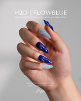 Majorelle Blue statement nails with vibrant blue contrast and sculpted swirl texture
