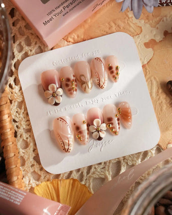 Caramel Cream nail set with warm brown theme, 3D flowers, and delicate gold wire art