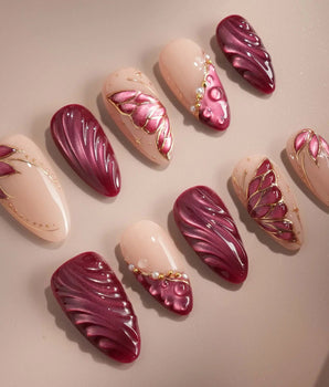 Velvet Flow handmade press-on nails featuring Sultry Berry Red, 3D Cat-eye Texture & Metallic Outlined Butterfly Wings.