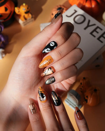 Nevermore press on nails with a black cat on a 3D copper pumpkin, a raven on a branch under an amber moon, ghosts and bats - image 4
