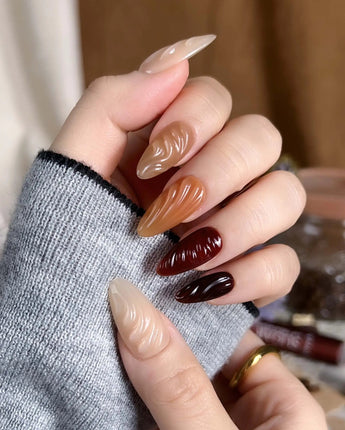 The Whole Fall press-ons with amber gradient color, syrupy 3D texture, and glossy finish