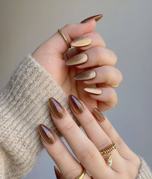 Light Brown Cat-eye nail set with neutral brown magnetic shine and smooth gel polish