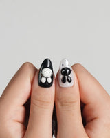 Dark Miffy nail art close-up showing black white red mix design bunny lace bow cherry swirl french 3D accents details