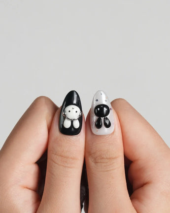 Dark Miffy nail art close-up showing black white red mix design bunny lace bow cherry swirl french 3D accents details
