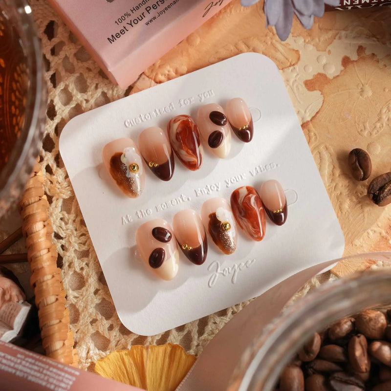 Latte Coffee handmade press-on nails featuring coffee brown marble with 3D bean and foam accents — fall nail design by Joyee Nails