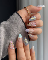 Aqua Petal custom-size nails with pearly blue tones, 3D florals, and butterfly charm