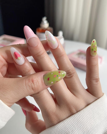 Haru Picnic Set close-up of strawberry and floral cute nail art on glossy gel