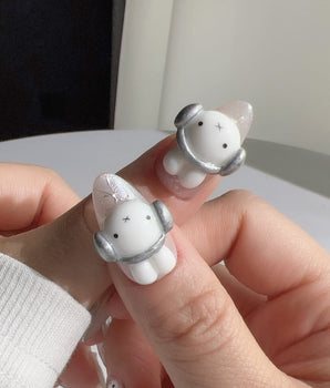 Miffy's Vacay playful holiday nails with sculpted rabbit charm and mirror silver chrome