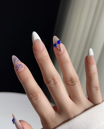 Klein Blue Cherry handmade press-on nails featuring Klein Blue Cherry french tip nails
