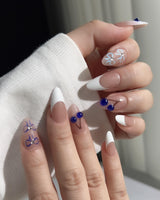 Klein Blue Cherry reusable nail set with clean white tips and graphic cherry accents