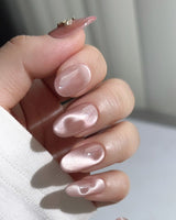 Thump Bunny custom press-on nails with soft pink heart shimmer and cute accents