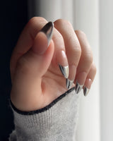 Silver Sleek reusable nails with sleek metallic French manicure styling