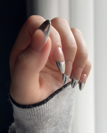 Silver Sleek reusable nails with sleek metallic French manicure styling