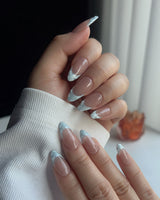 Sea Salt custom press-ons with clean sky blue French tips for summer and wedding looks