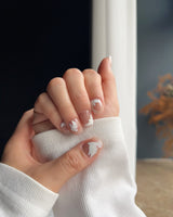 Hand-Painted Echoes of Peace handmade press-on nails featuring White Peace Doves nails