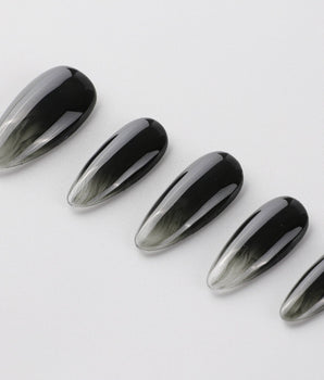 Cutting Edge handmade press-on nails featuring Black ombre nails