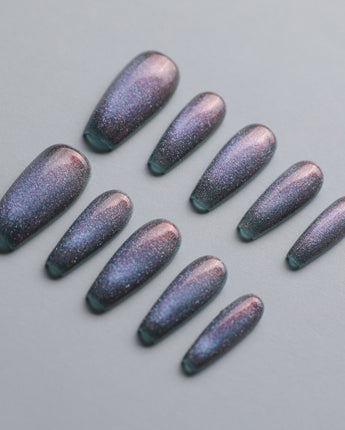 Spinning Aurora custom press-on nails — available in multiple shapes and sizes