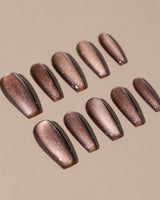 Arabica Cat-eye press-ons with warm coffee shimmer and soft caramel reflection