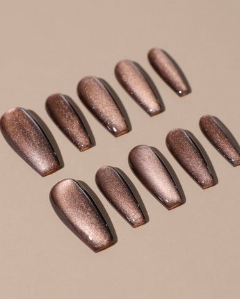 Arabica Cat-eye press-ons with warm coffee shimmer and soft caramel reflection