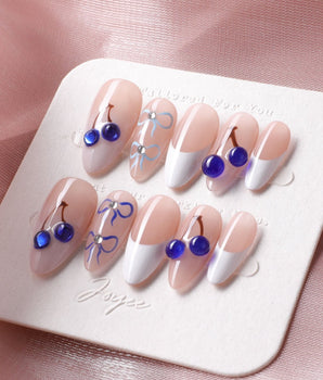 Klein Blue Cherry handmade nails with crisp French tips and cobalt blue cherries