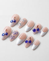 Klein Blue Cherry custom press-ons with high-fashion blue cherry French manicure