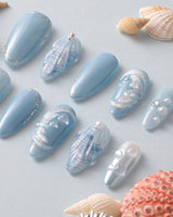 Mermaid Nail Designs Tale sky blue press-on nails with sculpted shell and wave accents