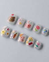 Squishy Pop extra short squoval press-on nails with colorful bubbly decal art