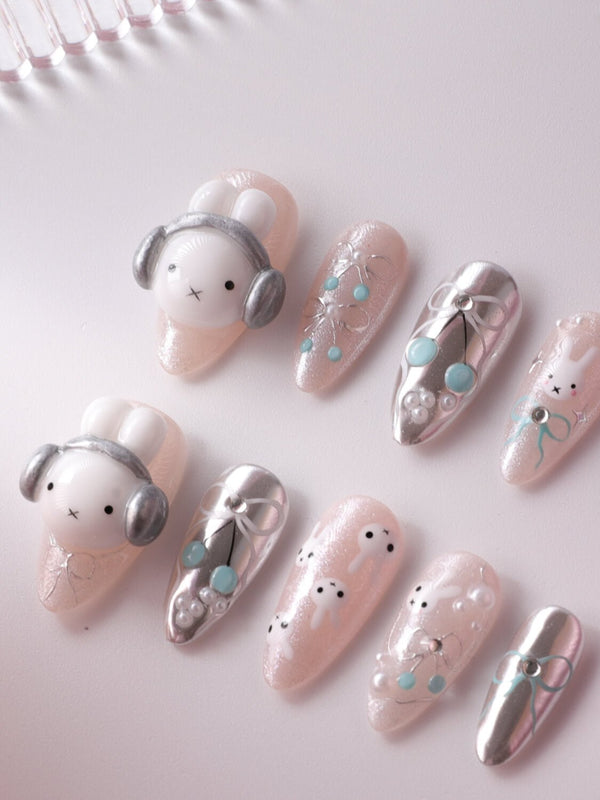 Miffy's Vacay medium almond nails with 3D headphone rabbit detail and silver chrome accents