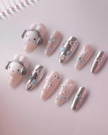 Miffy's Vacay custom-size nails with cute 3D character detail and chrome shine