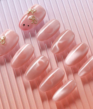 Thump Bunny pink cat-eye heart nail set with playful bunny accent
