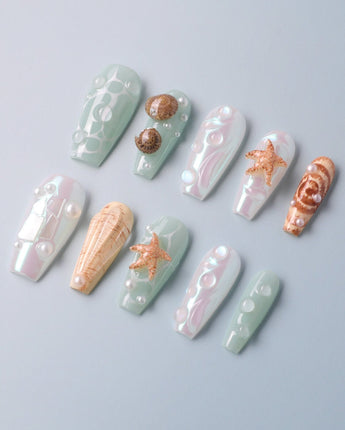 Mauritius Escape custom press-on nails with tropical shell accents and mint ocean shine