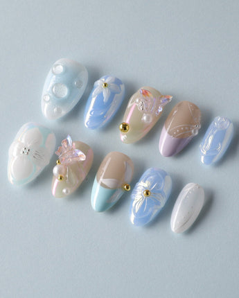 Aqua Petal reusable pastel nails with pearly flowers and dreamy butterfly styling