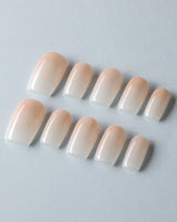 Ombre Gel nail art close-up showing nude clean minimalist nails details