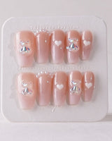 Cute Bear Hug press-on nails in medium coffin shape — cute nails