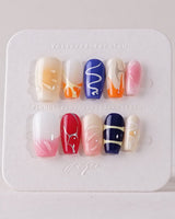 Candy Pop Colored press-on nails in short coffin shape — gradient multicolor abstract gloss nails