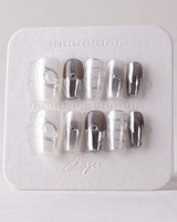 Silver Flame press-on nails in short coffin shape — silver chrome metallic 3D sculpted nails