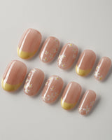 Petal Pop Spring Nails nail art close-up showing yellow floral french tip nails details