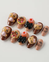 Cocoa Kitty Brown Color nails with chocolate brown gel art and playful 3D dessert styling
