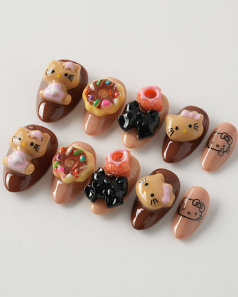 Cocoa Kitty Brown Color nails with chocolate brown gel art and playful 3D dessert styling