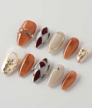 Luxury Vintage Gold short almond press-ons with antique gold detail and glossy finish