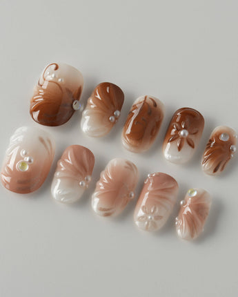 Brown & Khaki press-on nails in short oval with muted brown and khaki nail design